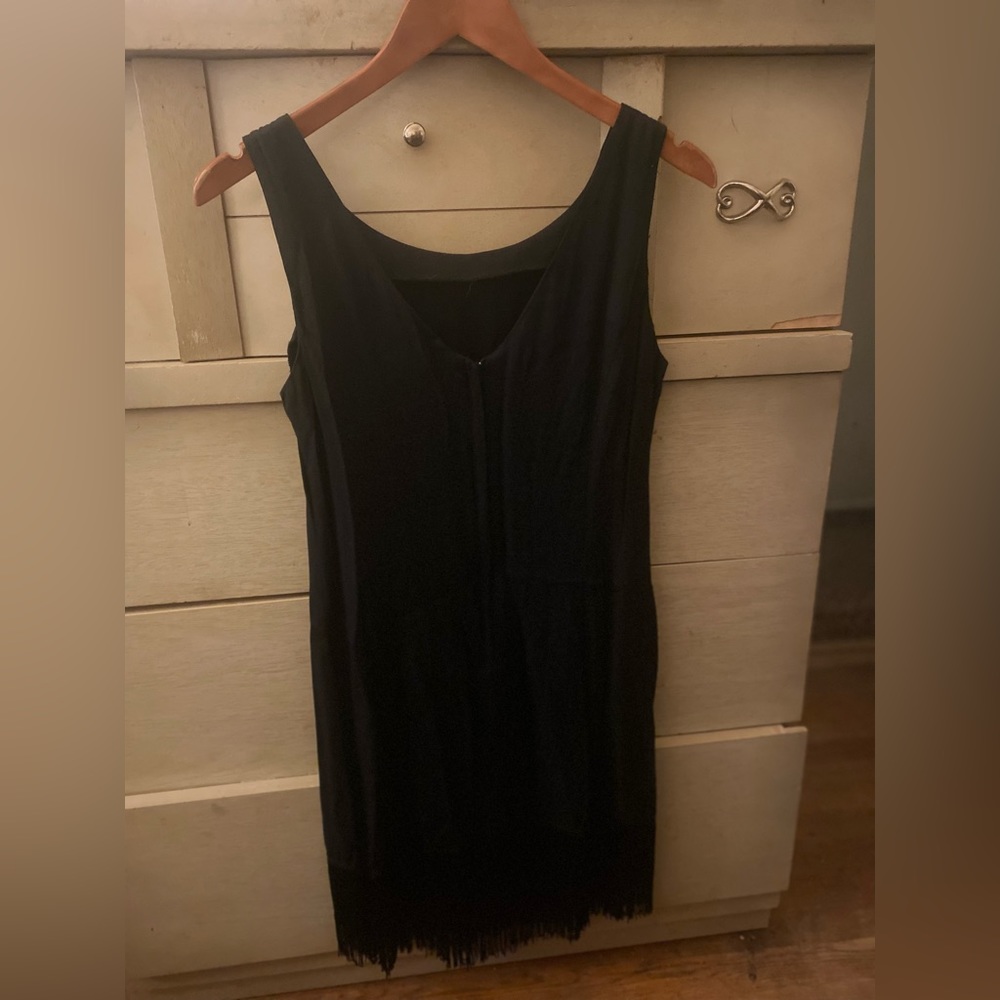 Black flapper dress•Comfortable and breathable polyester,  soft fringe. Size 7.